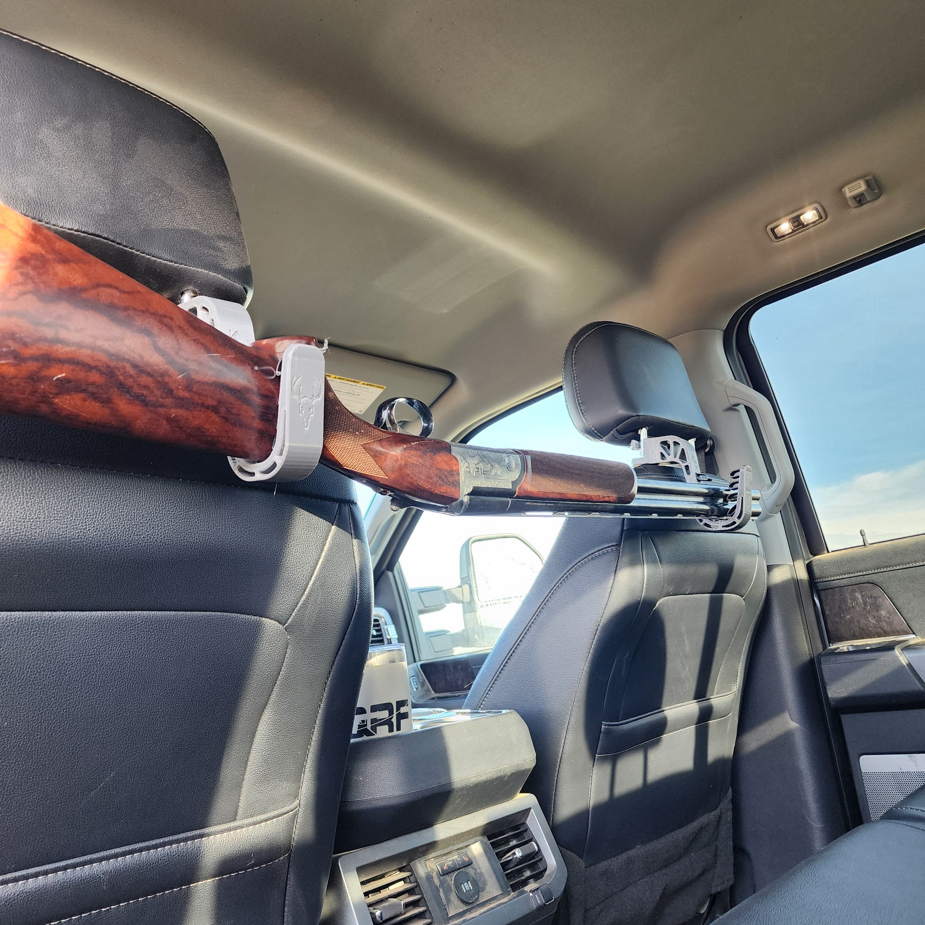 Head Rest Mounted Rifle Rack