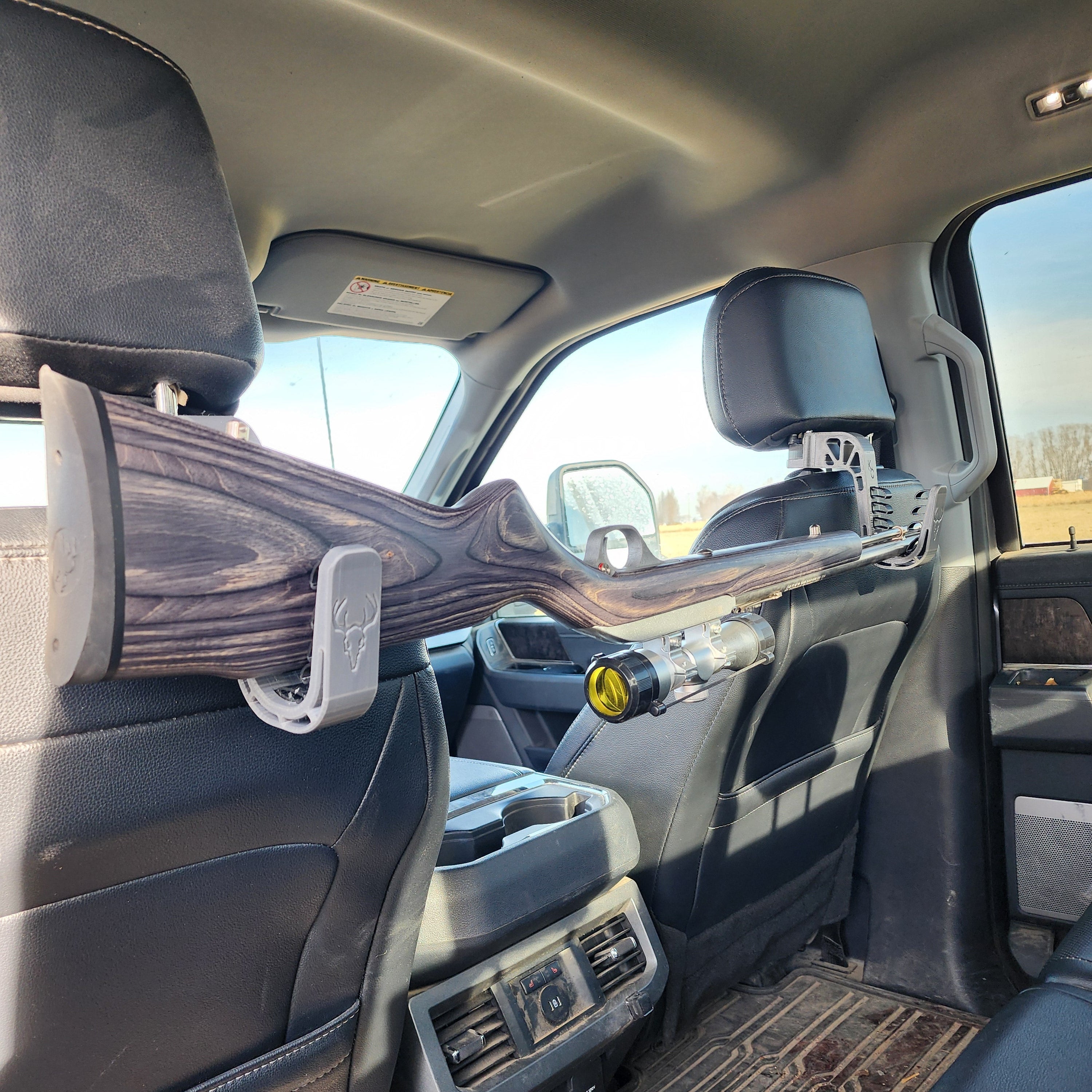 Head Rest Mounted Rifle Rack