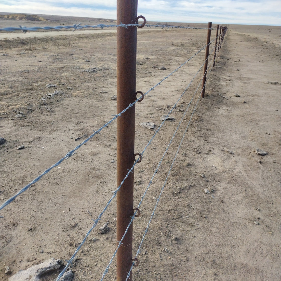 Weld-on Clips for Barbed Wire