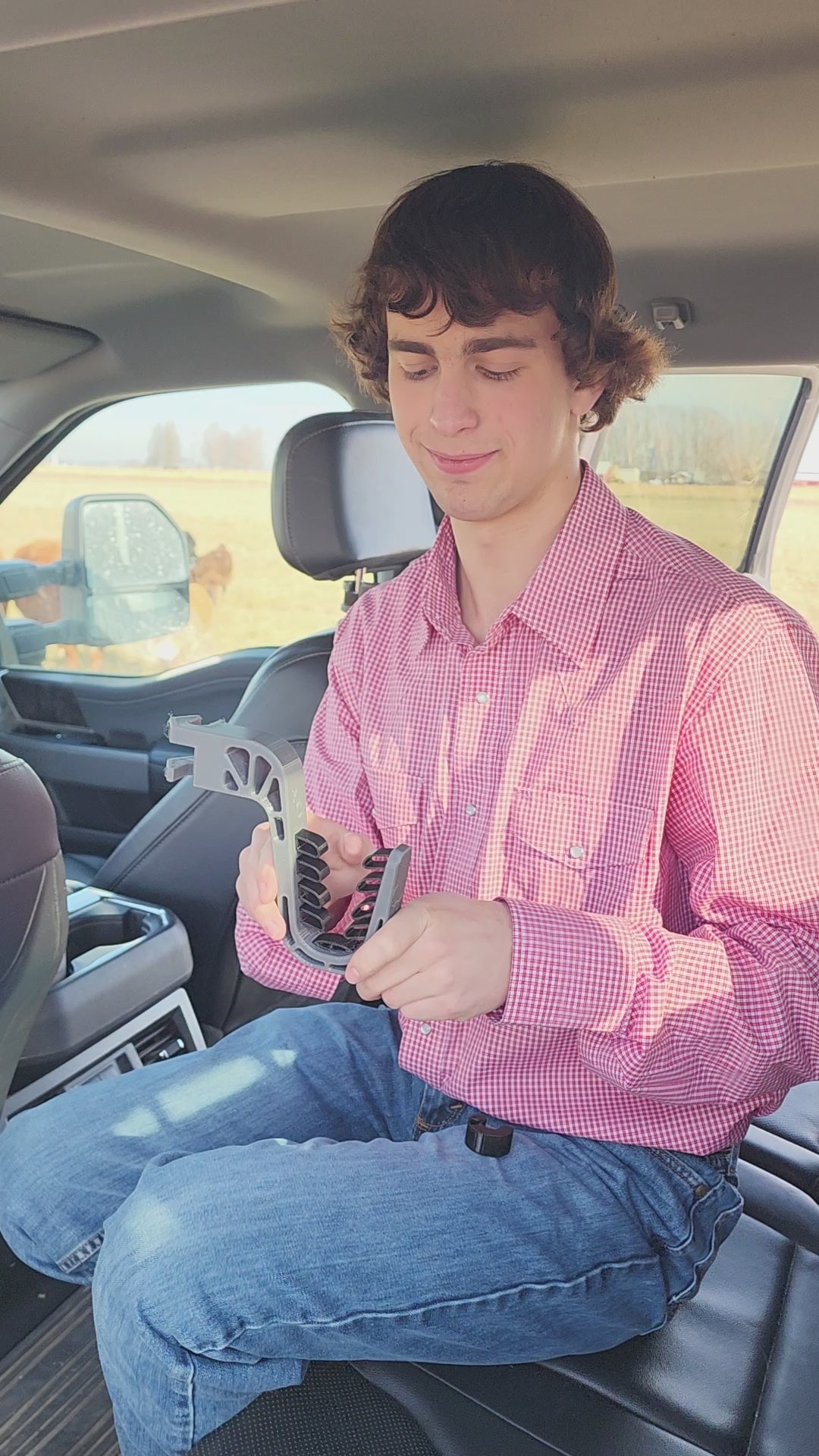 Head Rest Mounted Rifle Rack